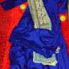 FABRIC : SOFT SILKY GEORGATTE IT COMES WITHJ 3 PIECE SET WHICH INCLUDES 1. FULL SLEEVE FROCK: TRAINGULAR NECK , SLIGHLY DEEP BACK AND DORI'S WITH HEAVY LATKANS 2. PAJAMA 3.PRINTED MUL COTTON DUPATTA COLOR : ROYAL BLUE PLAIN SUIT
